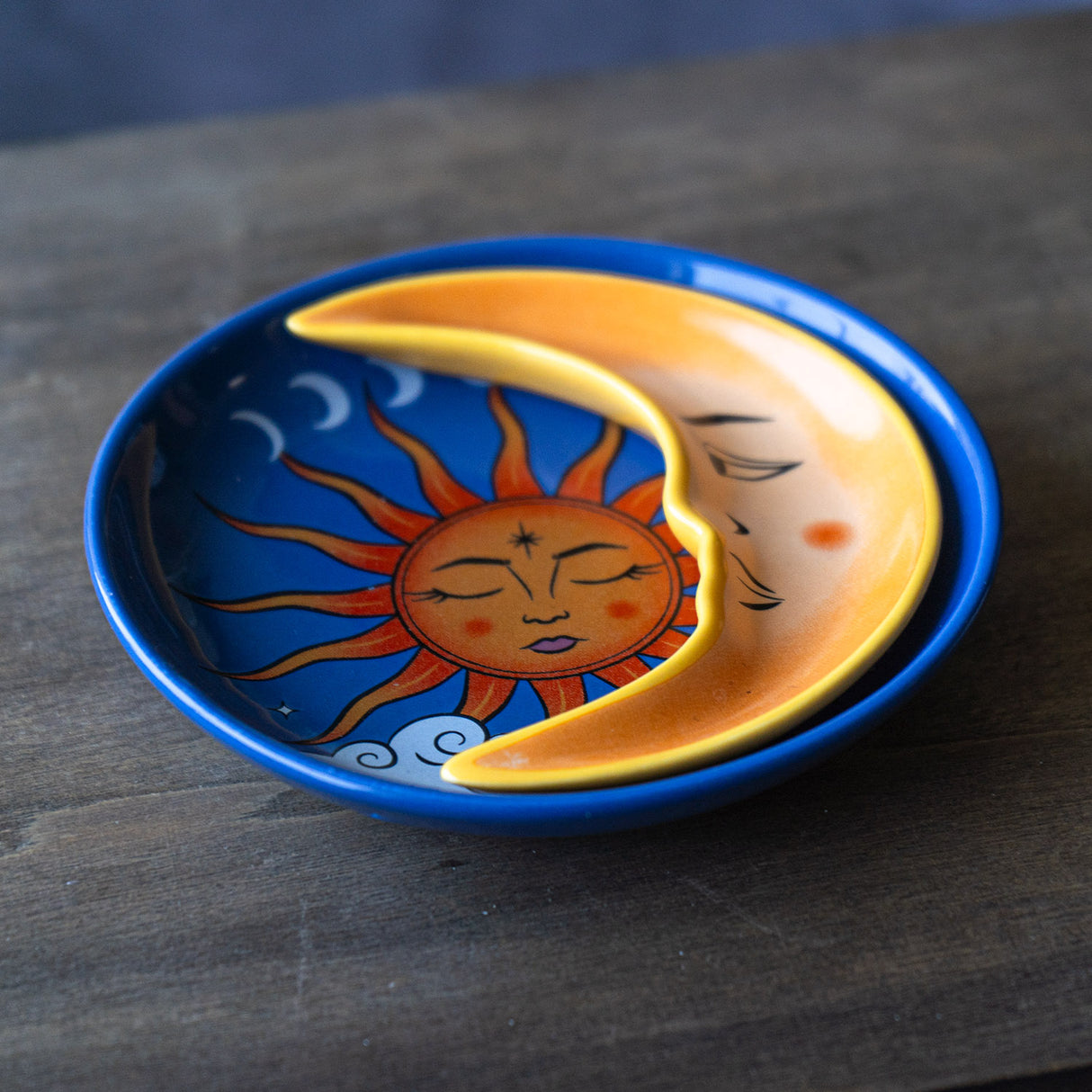 Trinket dish nesting set, blue round dish with sun and clouds, yellow crescent moon dish tucked inside