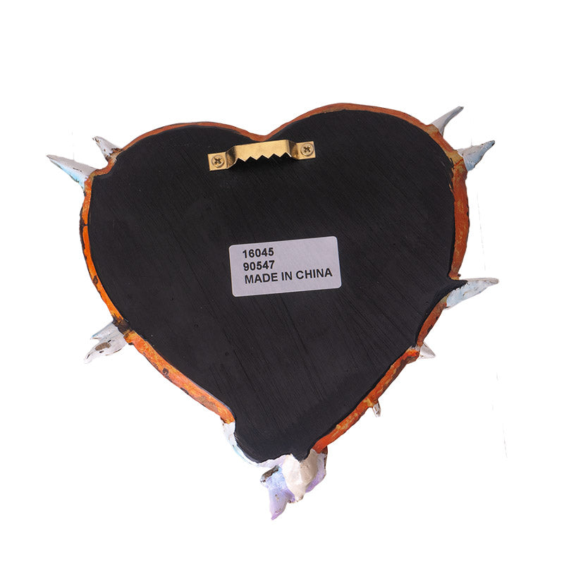 Back of heart-shaped fairy wall plaque showing hanger