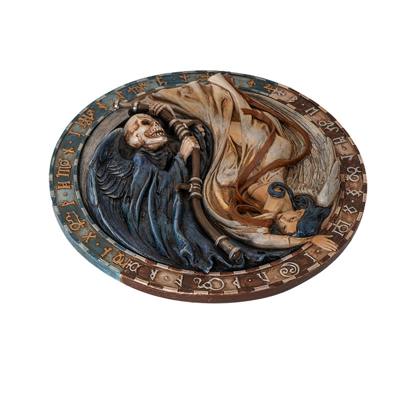 Wall plaque, angel on one side, ivory with blue hair and grim reaper with ivory skull on the other side, runes around the circular edges