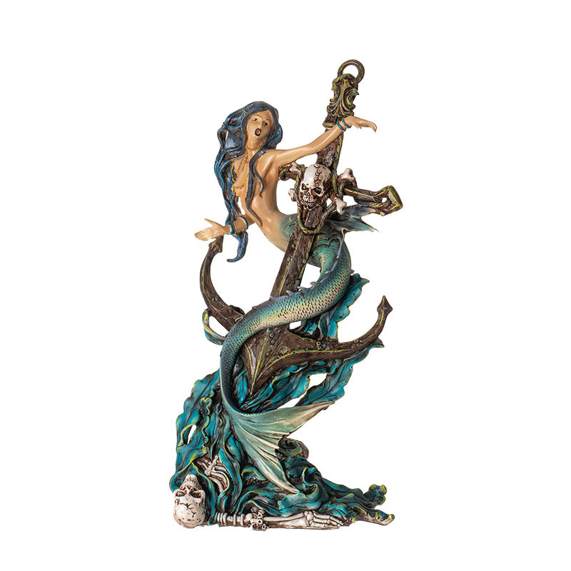 Figurine of a mermaid wrapped around an anchor with a skeleton and seaweed