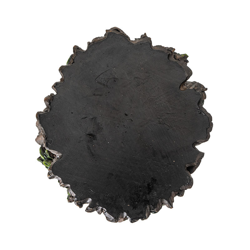 Sandtimer with glass hourglass, black sand, and ent faces on either end with spiraling roots, showing base