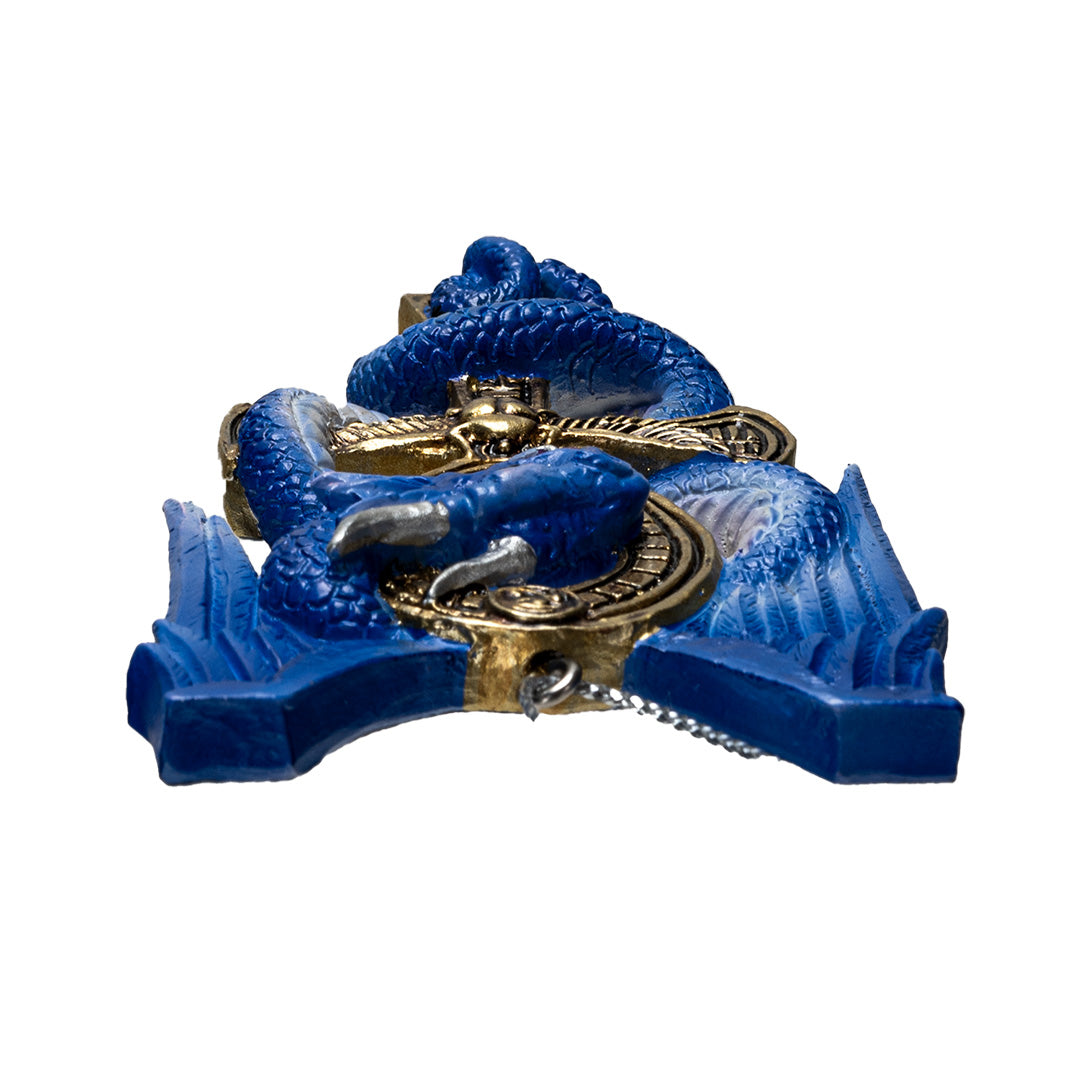 Ornament of blue dragon curled around golden Egyptian ankh