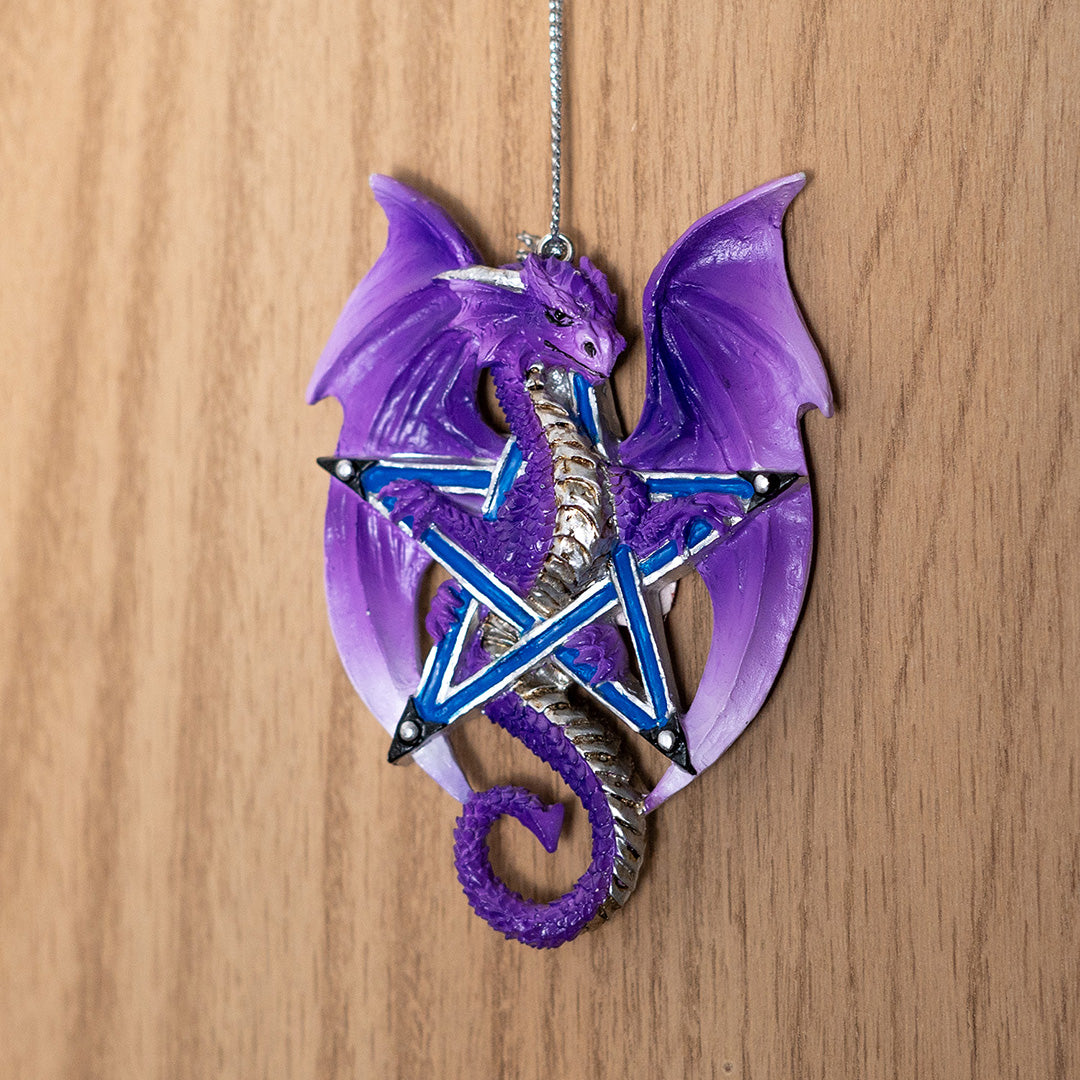 Purple and silver dragon crawling through a five pointed star blue pentacle, hanging ornament