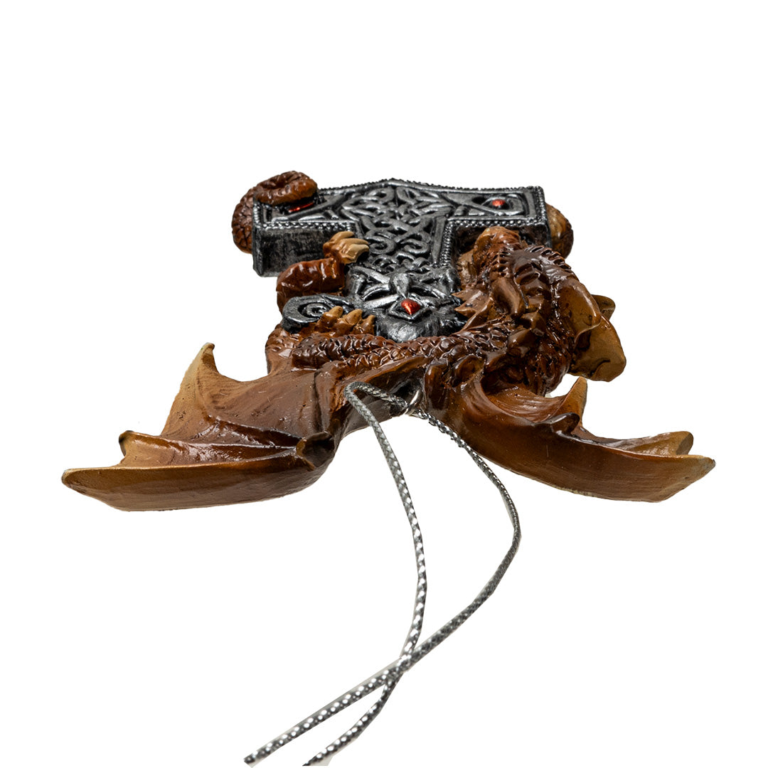 Ornament with brown dragon wrapped around silver Mjolnir (Thor's hammer) with Celtic knotwork, dangling from string
