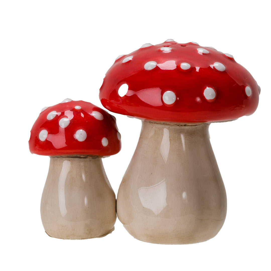 Pair of salt and pepper shakers shaped like red and white fly agaric (amanita) mushrooms