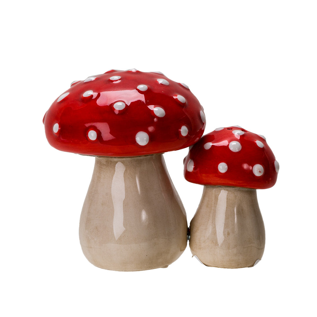 Pair of salt and pepper shakers shaped like red and white fly agaric (amanita) mushrooms