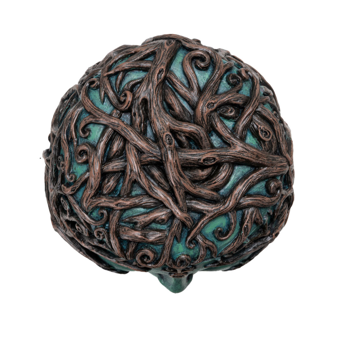 Round trinket box with the teal face of Gaia (Mother Earth), covered in branches, shown top down