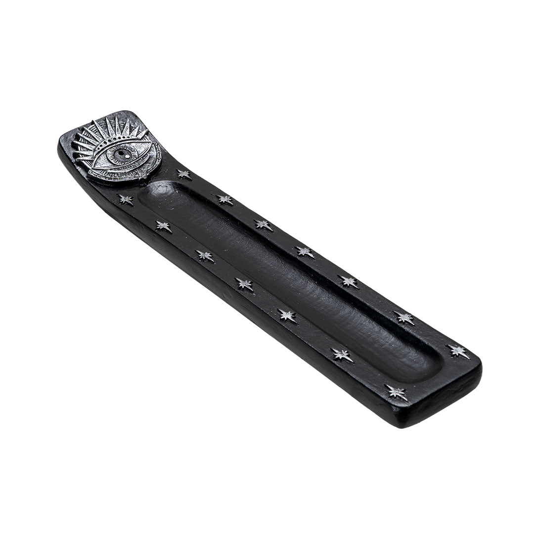 Black incense burner with silver eye design and silver stars