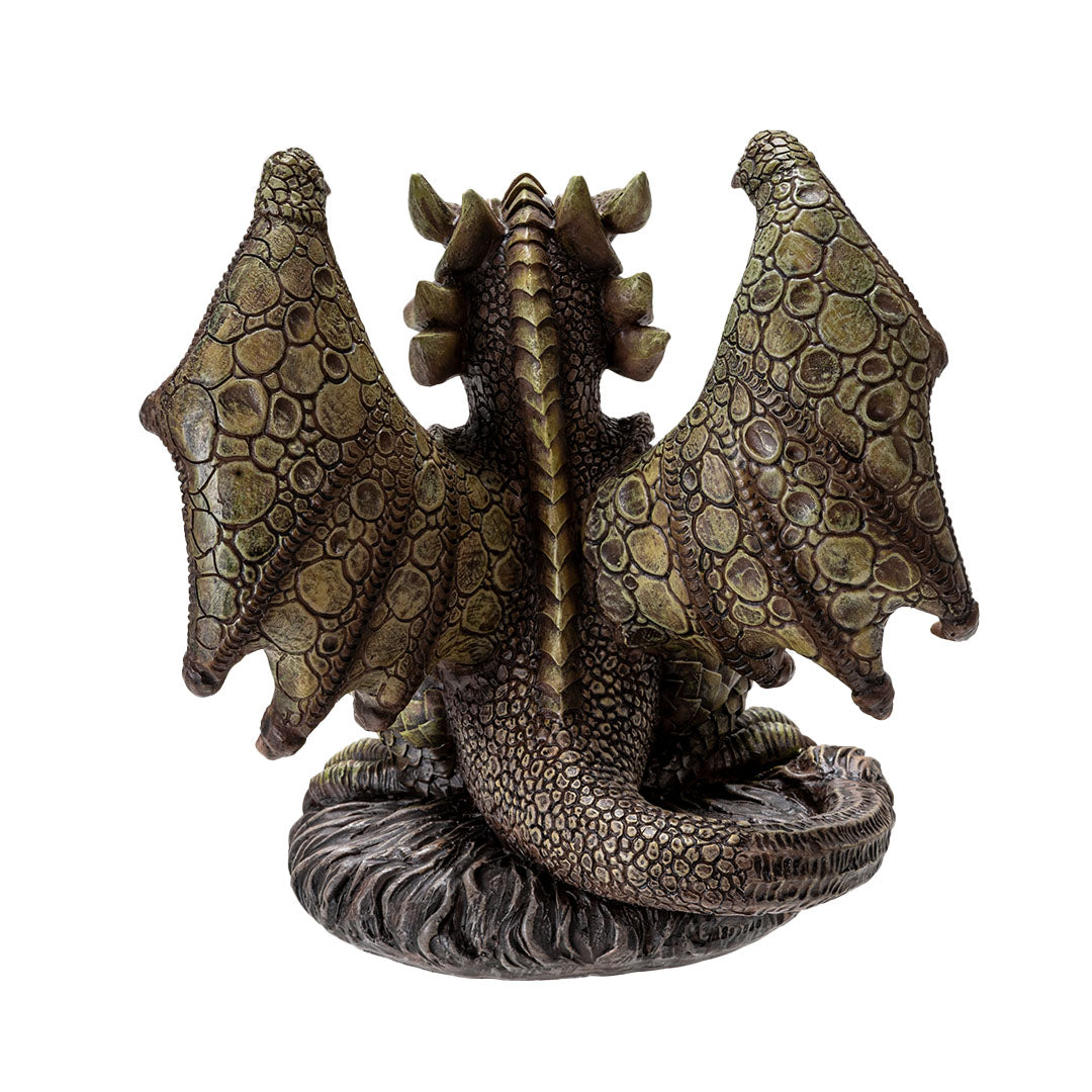 Candleholder figurine with tan/green dragon, red eyes, sitting with a cauldron, shown from the back with wings spread