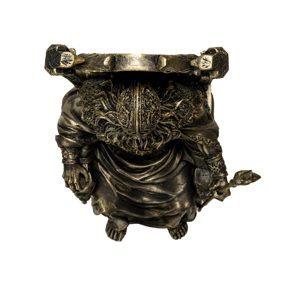 Figurine in faux bronze of Norse god Odin on throne with ravens and staff, shown top down