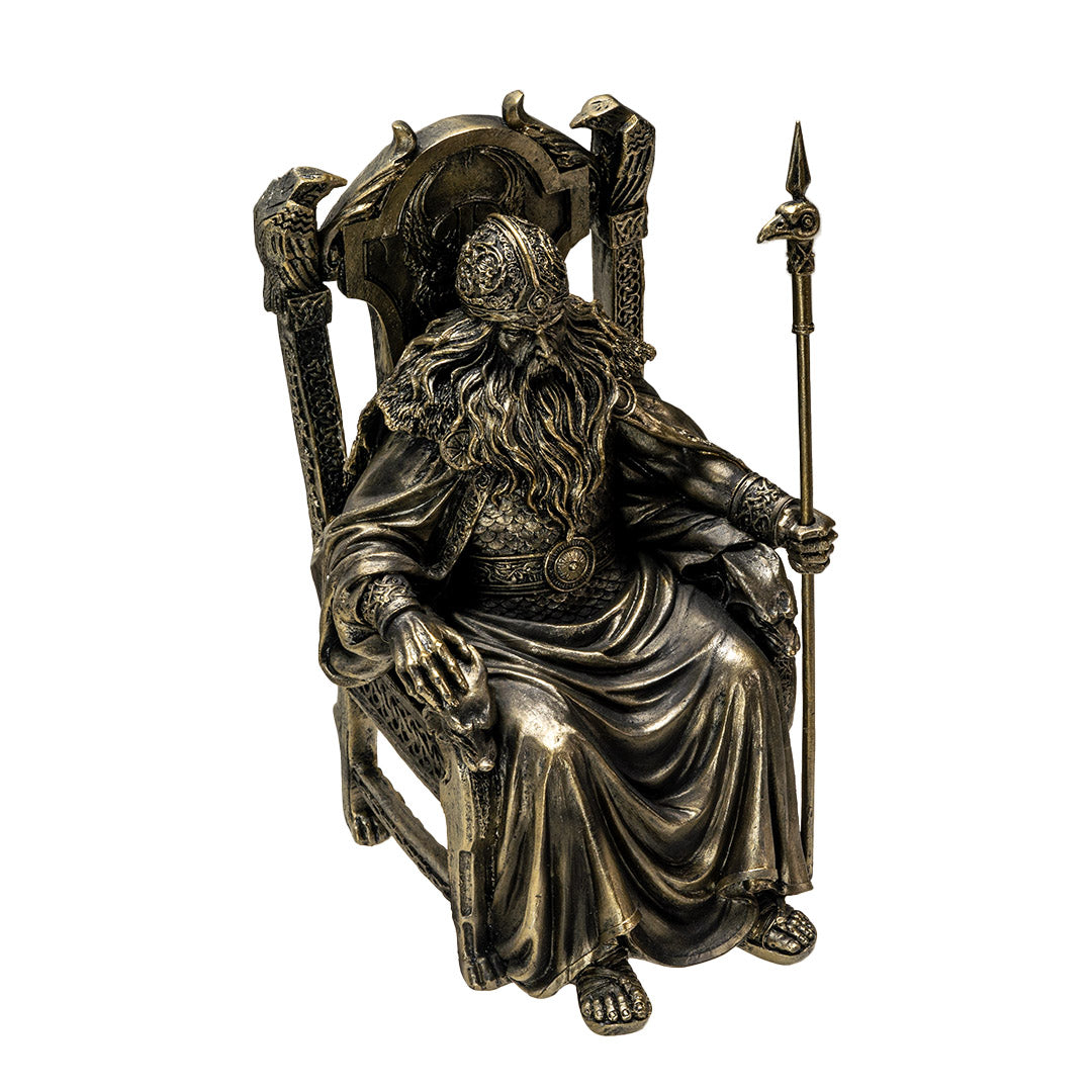Figurine in faux bronze of Norse god Odin on throne with ravens and staff