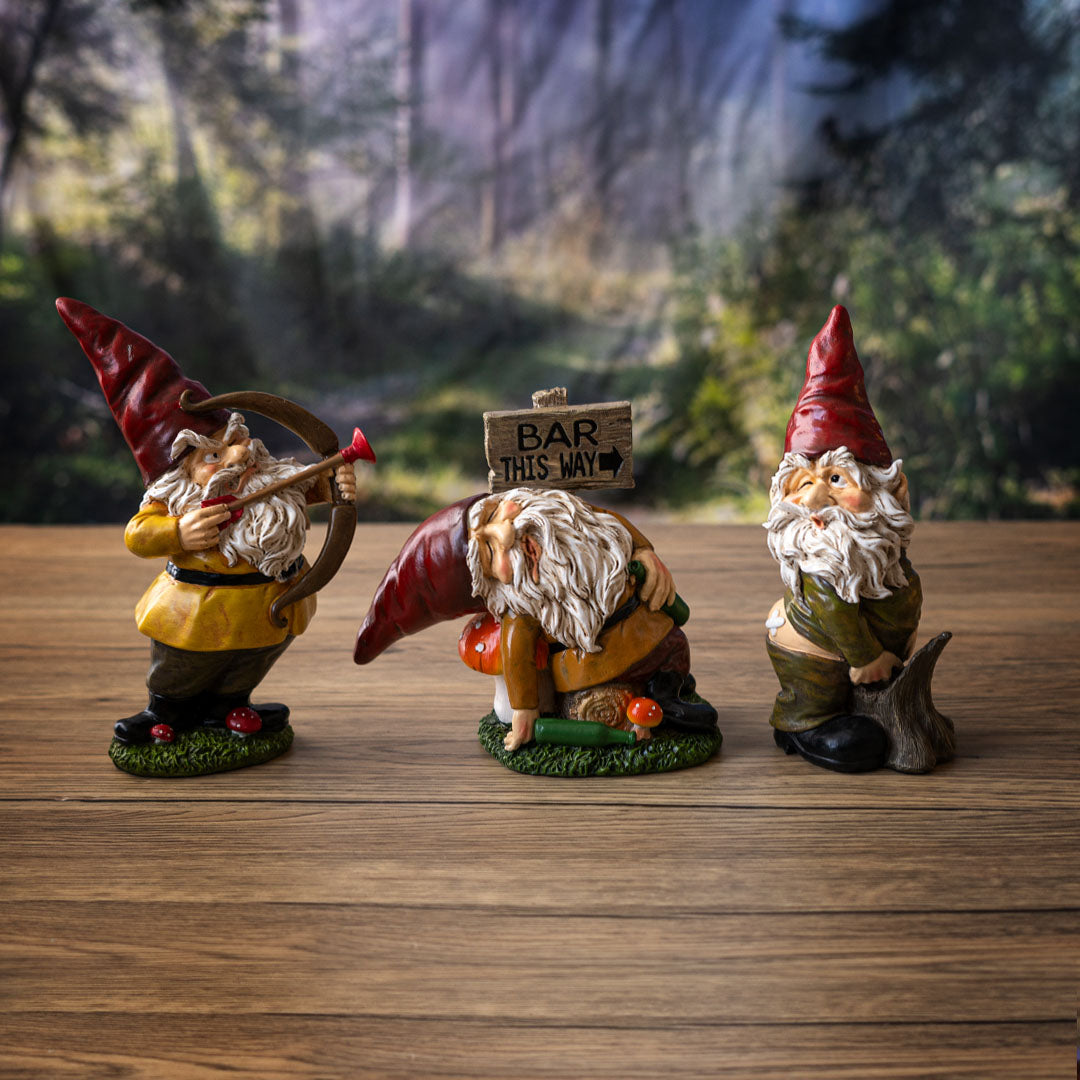Set of 3 gnome figurines - one with a plunger and bow, one passed out drunk, one mooning