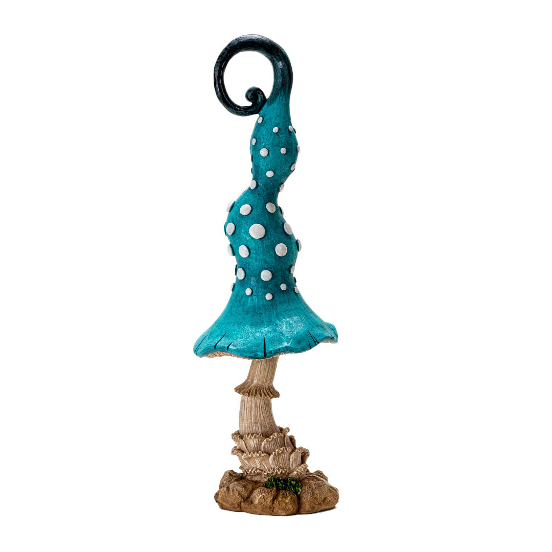 Figurine of tall mushroom with blue cap (white spots on it ) and tan stem