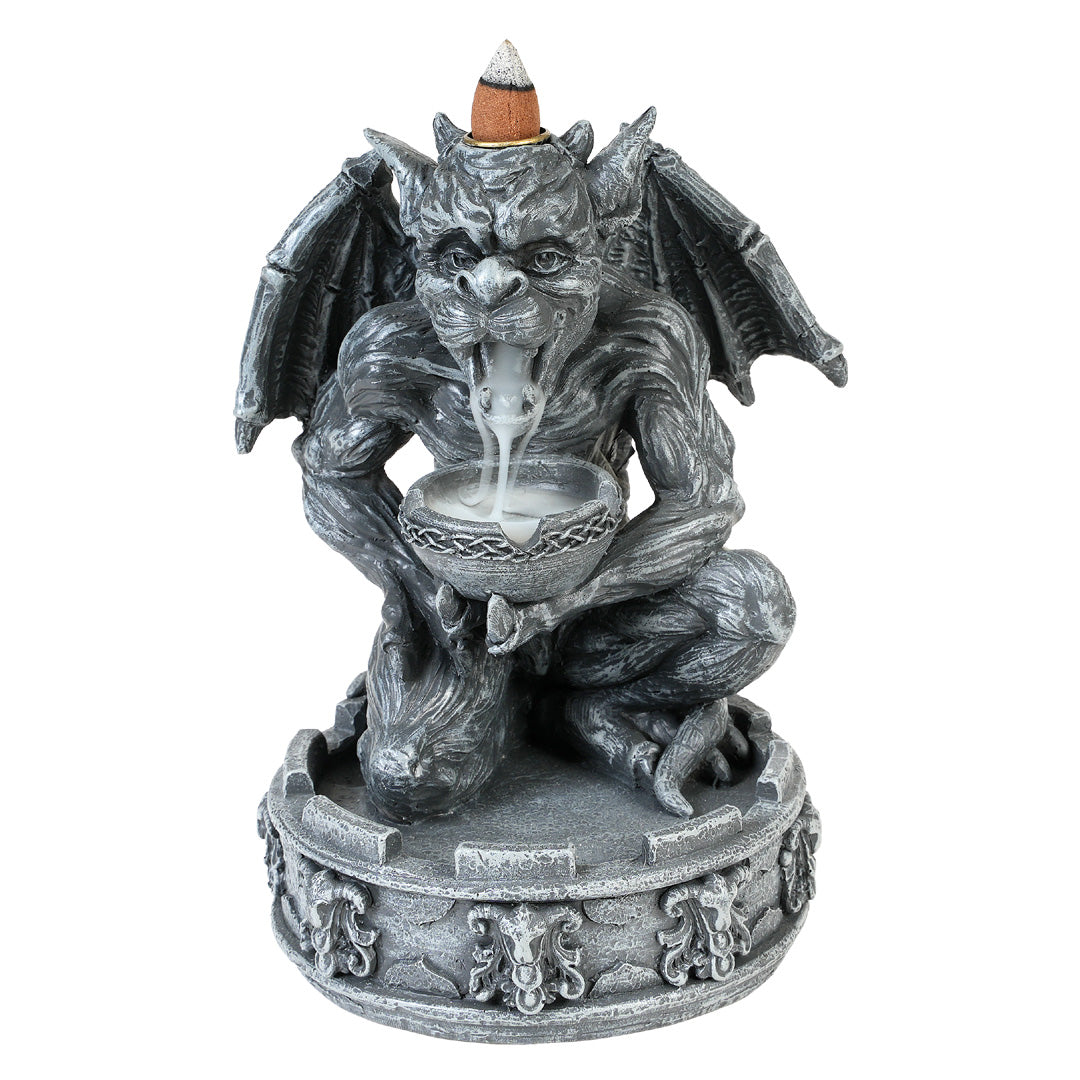 Backflow incense burner figurine, shaped like a faux-stone gargoyle holding a bowl. Smoke flows out of his mouth.