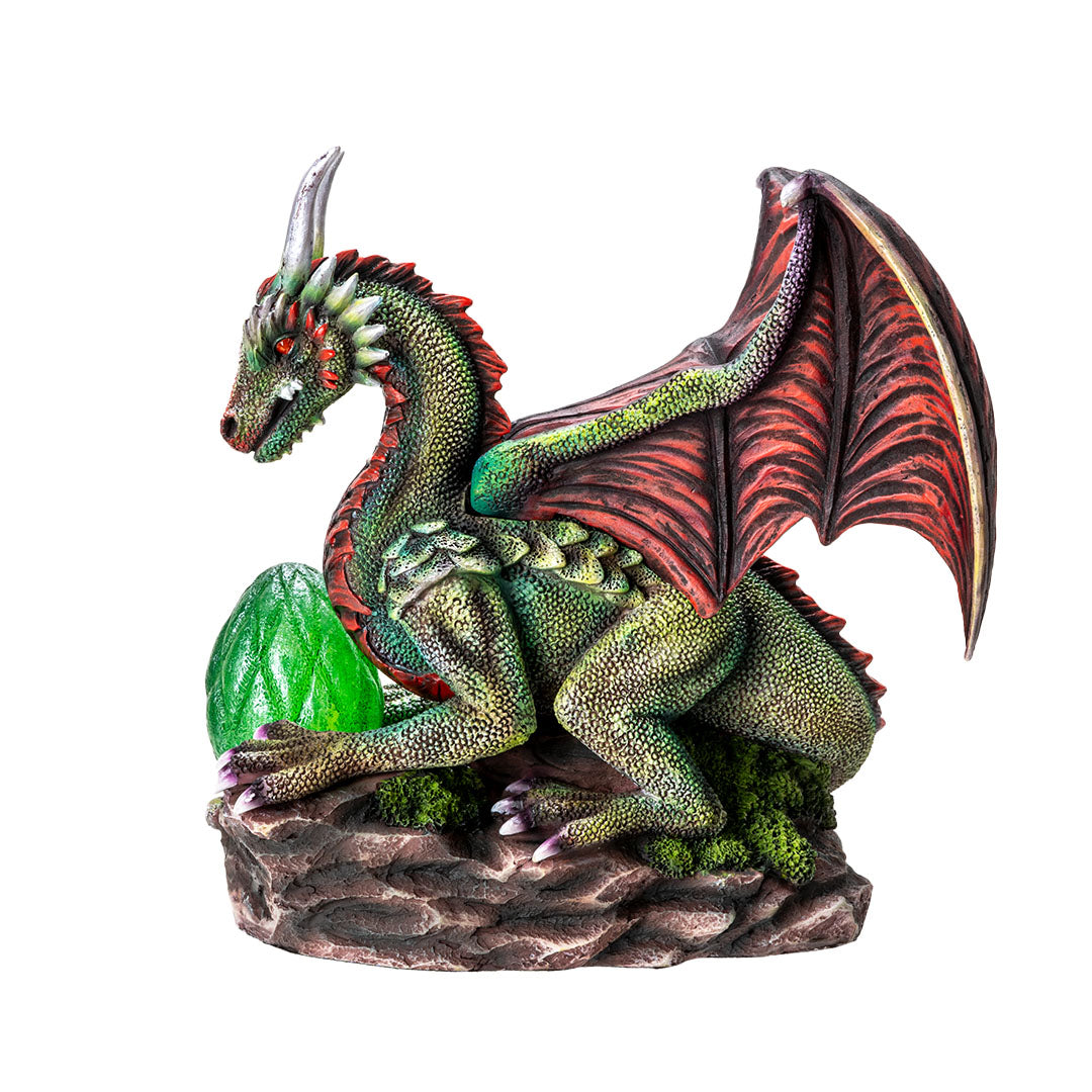 Figurine of green dragon with red wings, spines, eyes and belly, with an egg in front that can glow with LED lighting