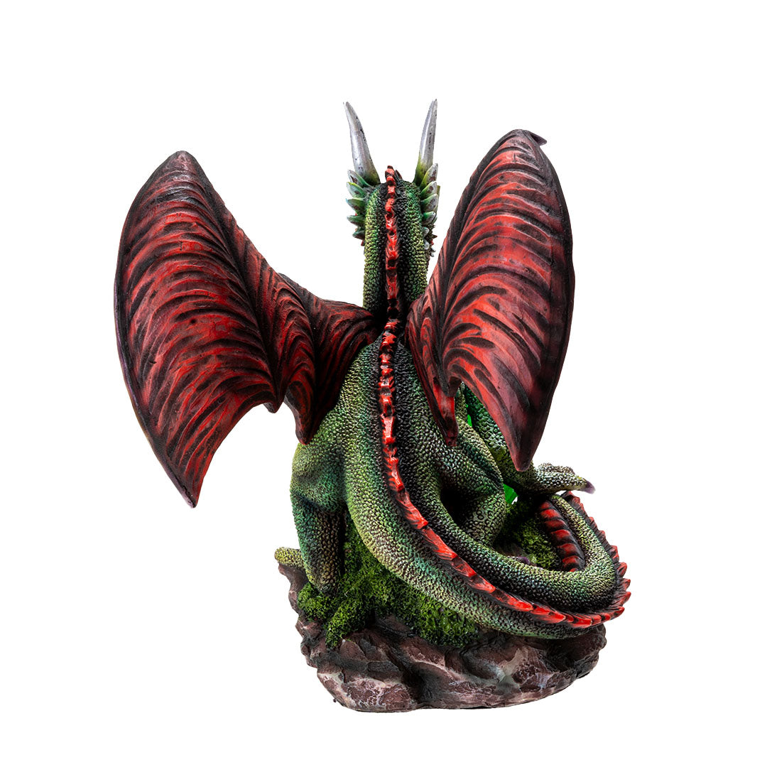 Figurine of green dragon with red wings, spines, eyes and belly, with an egg in front that can glow with LED lighting, back view
