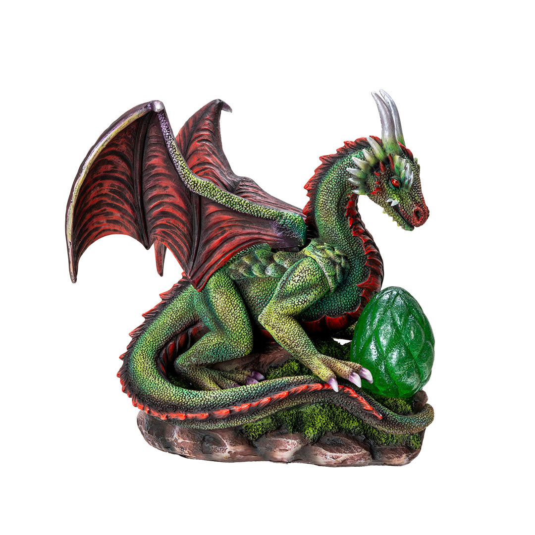 Figurine of green dragon with red wings, spines, eyes and belly, with an egg in front that can glow with LED lighting