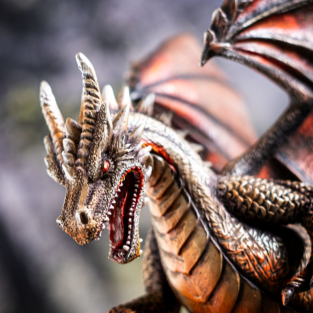 Closeup of dragon's face, mouth open in a snarl, red eyes