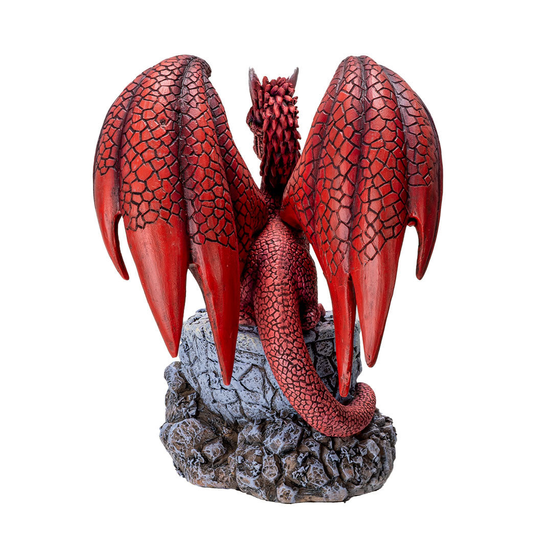 Figurine of red dragon parent with baby hatchling on rocky pedestal, shown from the back, red wings with scales