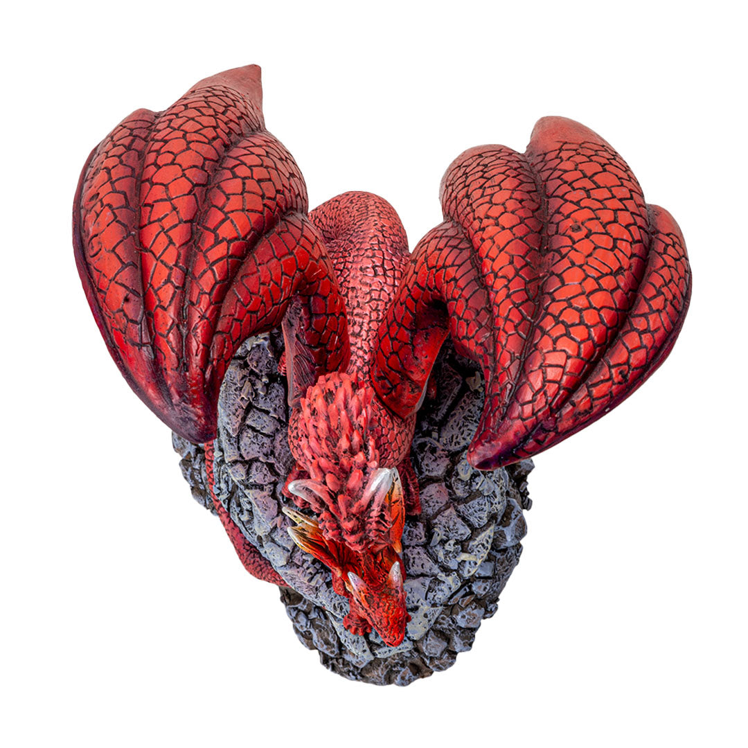 Figurine of red dragon parent with baby hatchling on rocky pedestal. shown top down