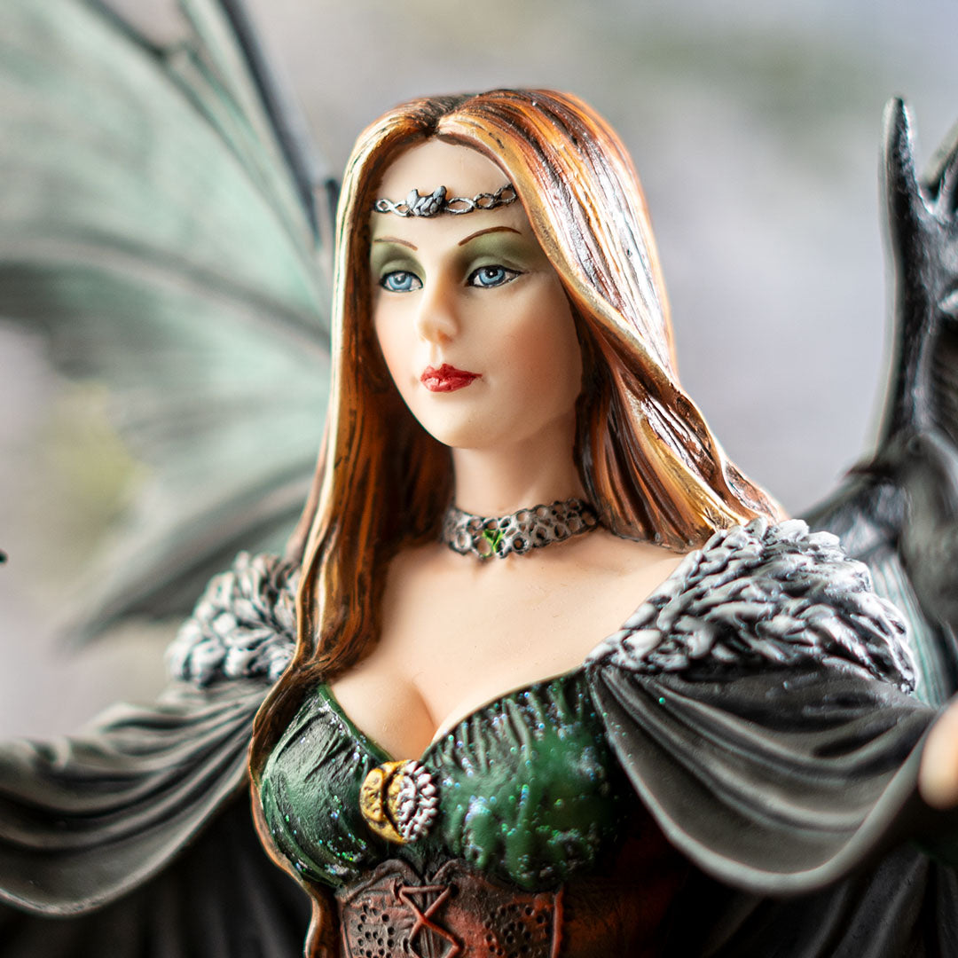 Closeup, red-blond hair, blue eyes, cloak and green dress