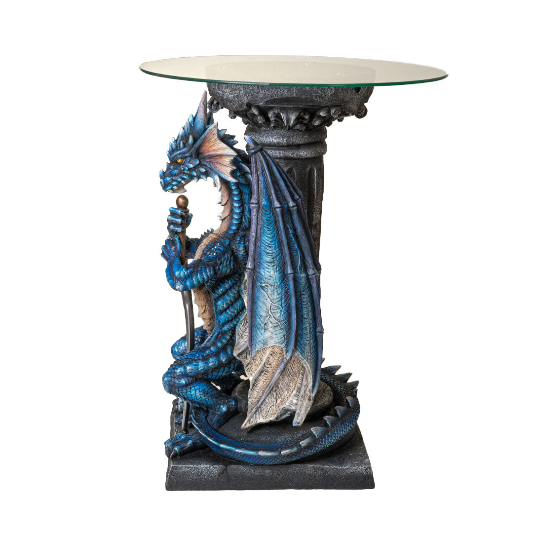 Glass topped table. Base is a blue dragon with spread wings holding a sword