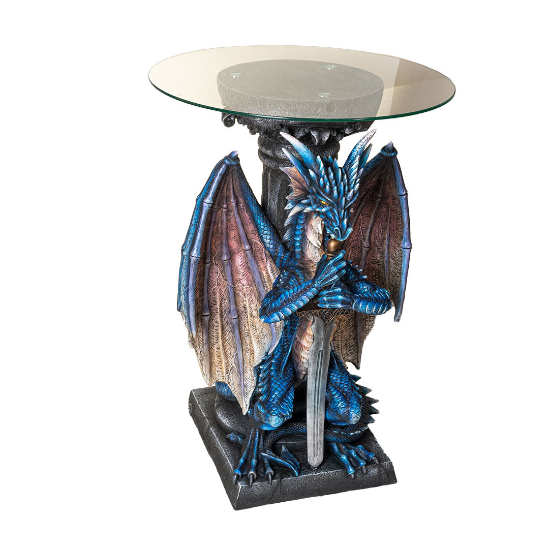 Glass topped table. Base is a blue dragon with spread wings holding a sword