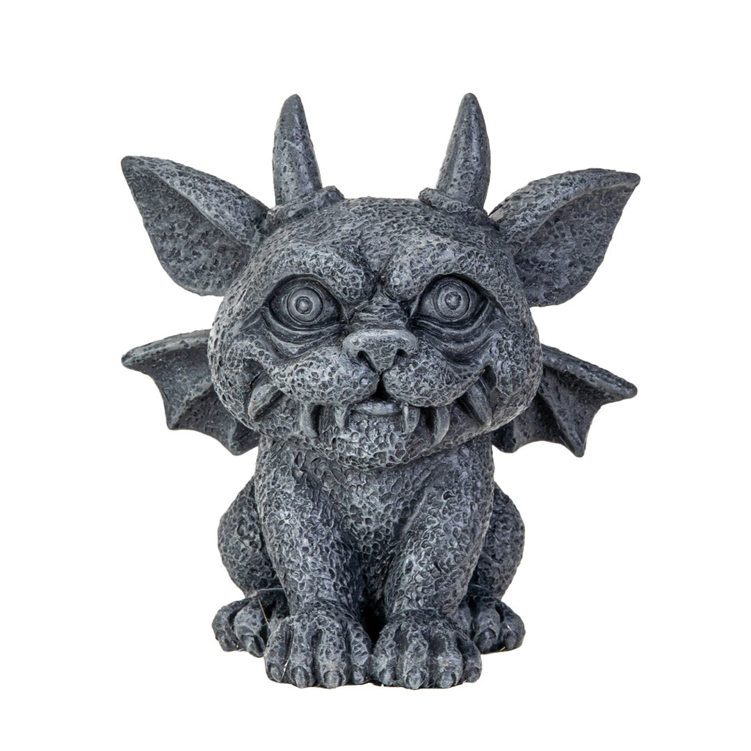 Statue of a gargoyle creature with large eyes, horns and wings in faux-stone finish