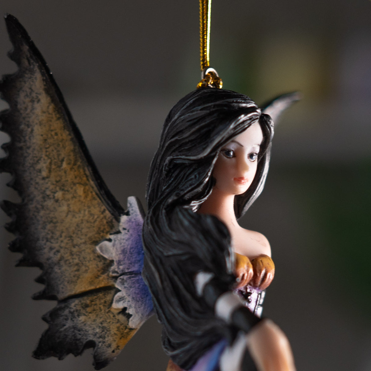 Closeup, fairy, lack hair, wings in purple, tan, black