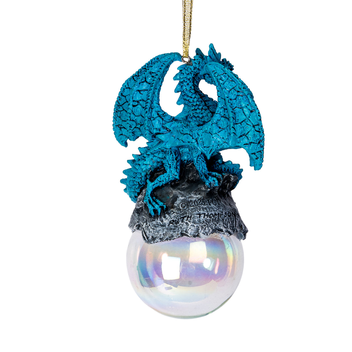 Blue dragon ornament on rock on glass orb, shown from the back