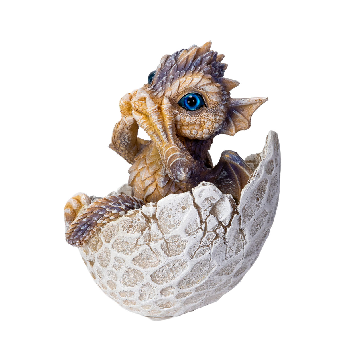 Dragon figurine hatching from an egg, bright blue eyes