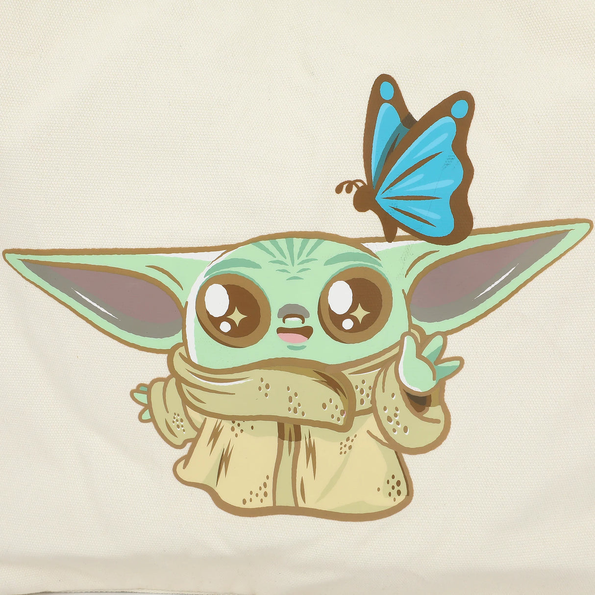 Tote bag with pale green handles and chibi Grogu with butterfly from The Mandalorian