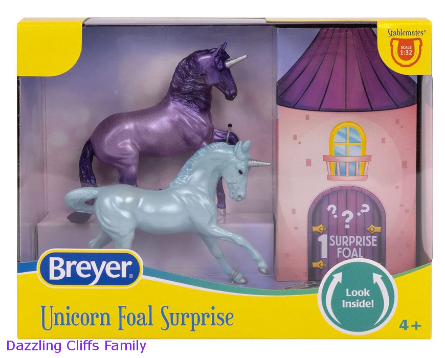 Breyer Unicorn Foal Surprise toy set set with two adult unicorns and hidden foal figurine. Shown models are purple and blue, the Dazzling Cliffs Family