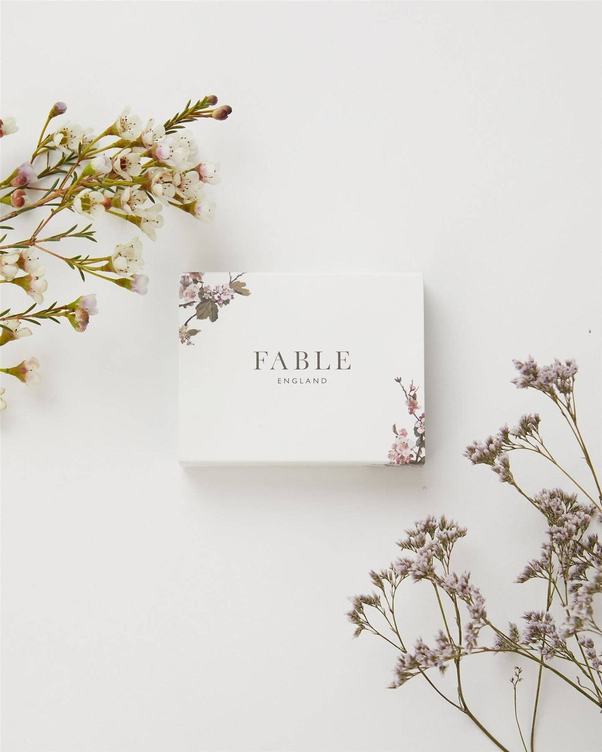 Fable England box with floral elements on a light background