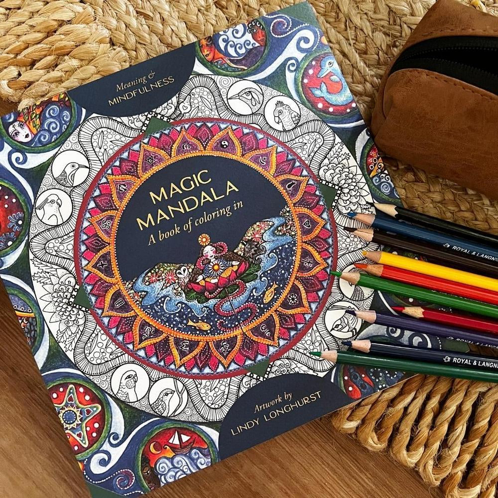 Coloring book titled 'Magic Mandala' shown with colored pencils