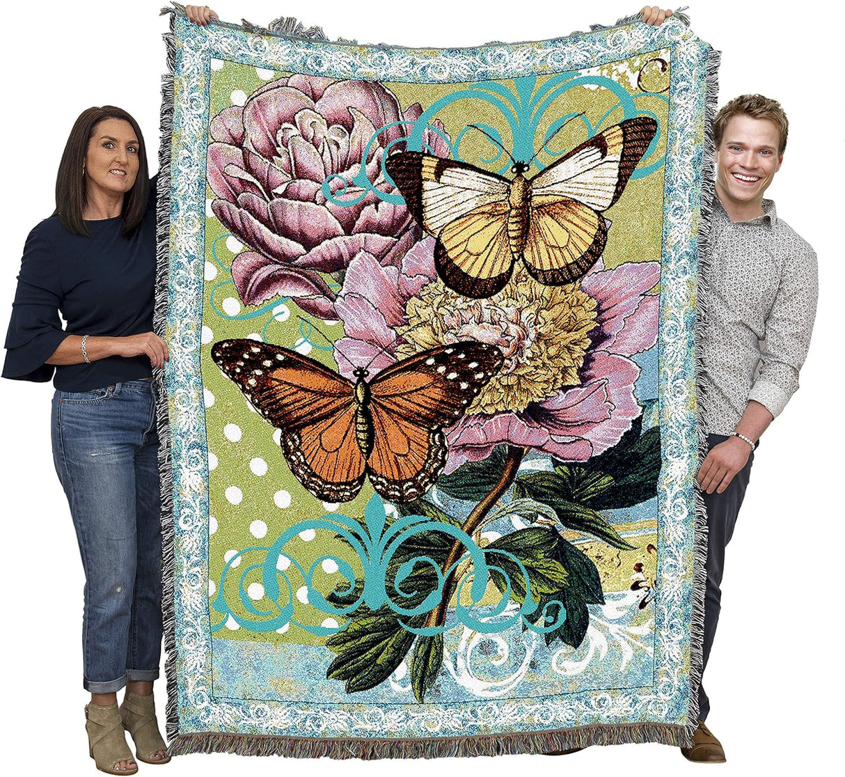 Butterfly floral blanket held by two adults to show large size