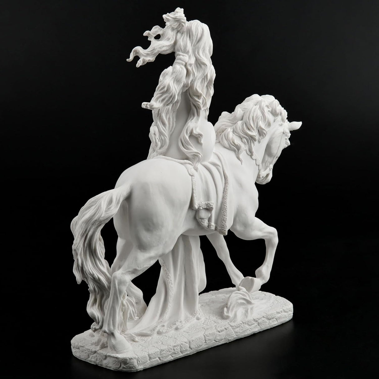 Sculpture of Lady Godiva riding a horse in the nude, clothed in her hair