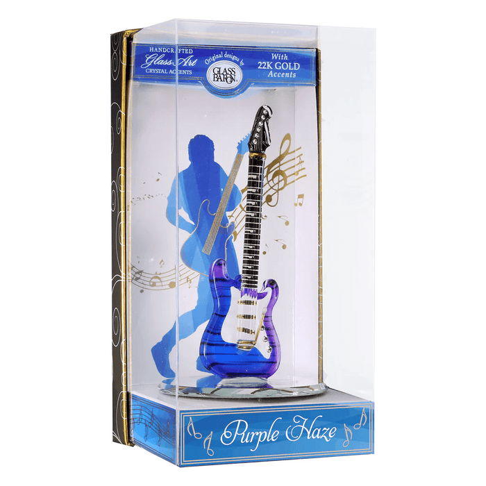 Figurine of a glass guitar with blue and purple ombre, black stripes, white and black with gold accents. In a musical-themed keepsake box from Glass Baron