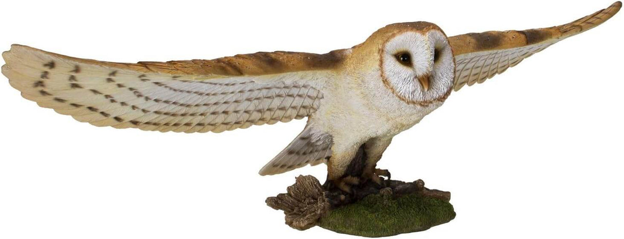 Flying barn owl figurine with brown and white feathers