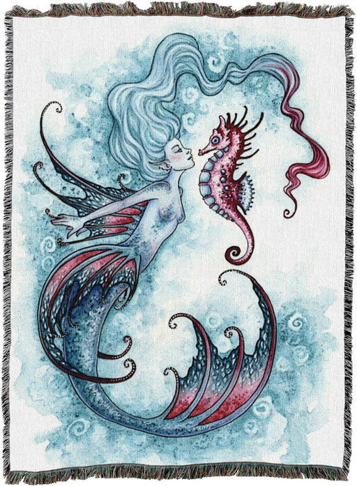 Tapestry blanket by Amy Brown showing mermaid in shades of blue with pink accents, and pink seahorse.