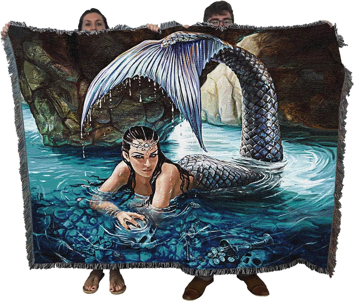 Tapestry blanket held by two adults to show large size