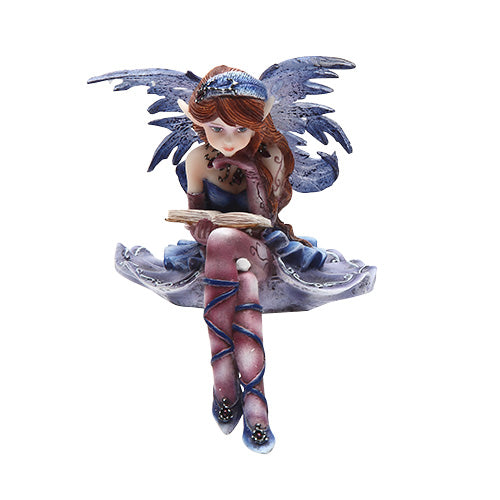 Seated fairy figurine to perch on a shelf. Blue wings and dress, red hair, purple stockings, reading a book.