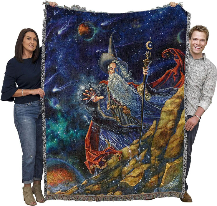 Wizard tapestry blanket held by two adults to show large size