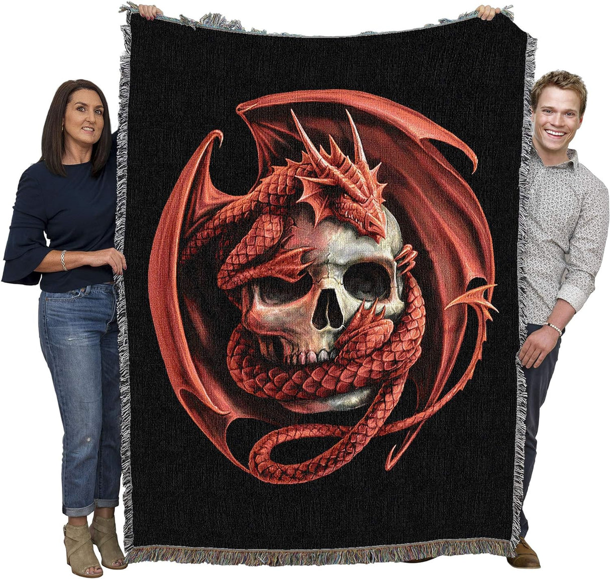 Tapestry blanket held by adults to show large size