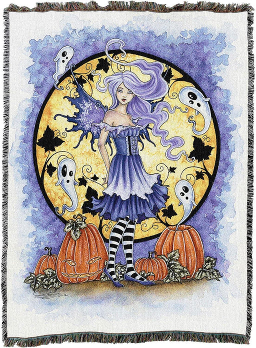 Tapestry blanket by Amy Brown with a fairy and full moon, surrounded by ghosts and carved pumpkins