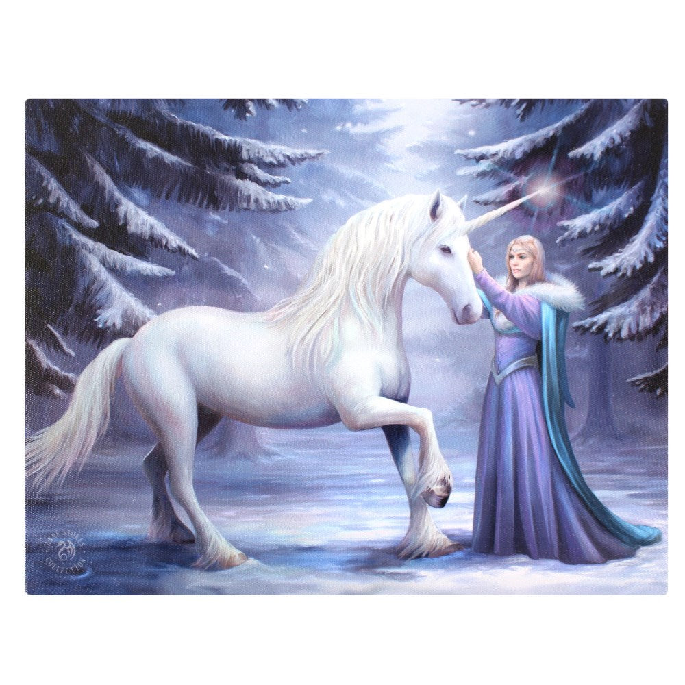 Canvas print, art by Anne Stokes, white unicorn and woman in a fancy dress in the snow with pine trees