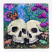 Two skulls with flowers, butterfly, frog, mushrooms on coaster