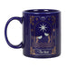 Dark blue mug with gold and white design of "The Star" tarot card