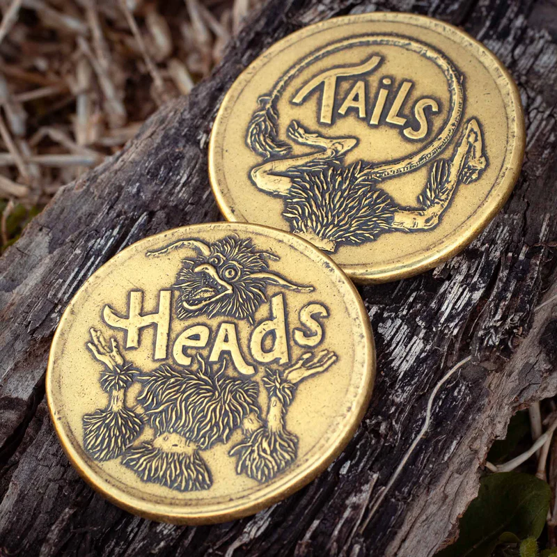 Firey from the Labyrinth Movie, heads or tails decision maker coin with both sides shown