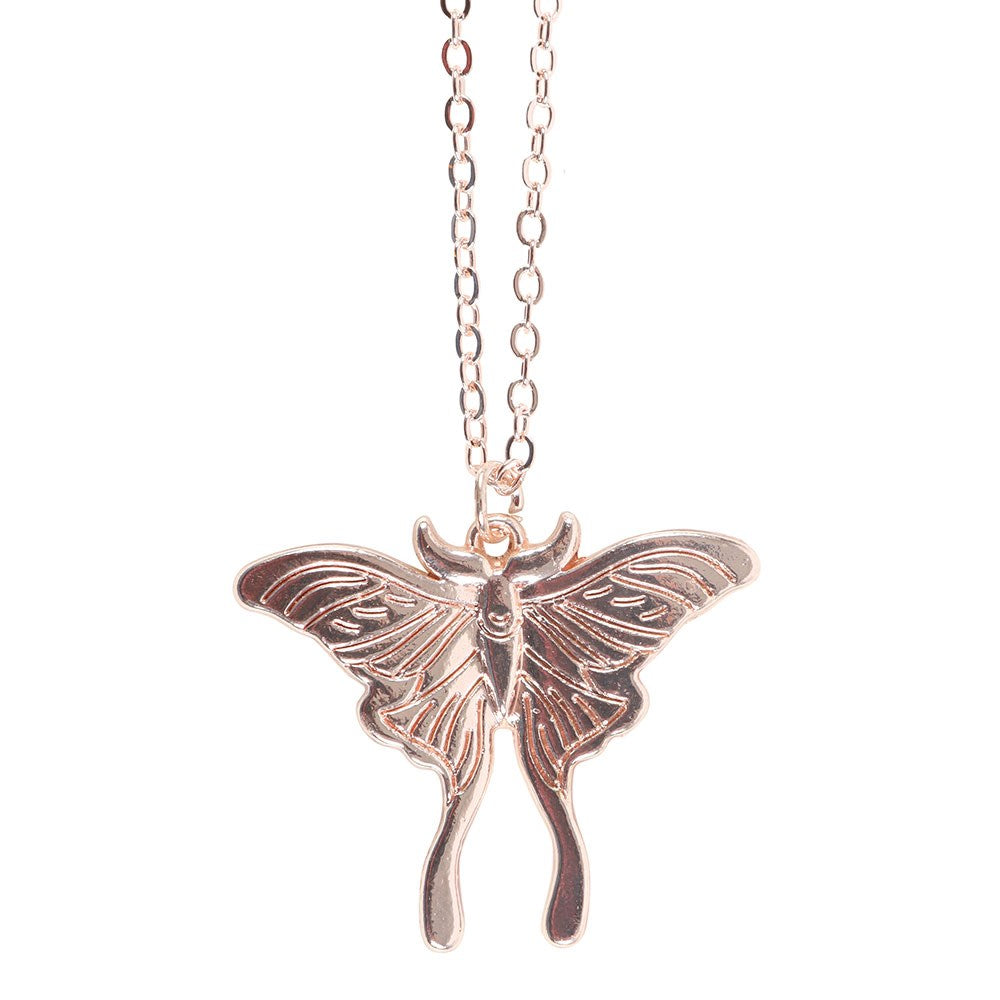 Metal luna moth necklace in a pale bronze-gold color